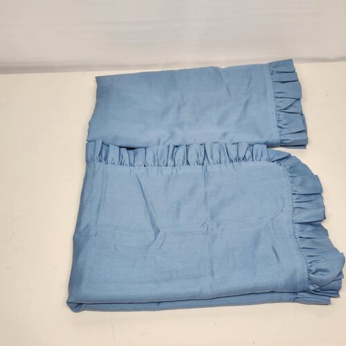 Blue Bed Skirt and Matching Blue Ruffled Pillow Cases For a Twin Size Bed