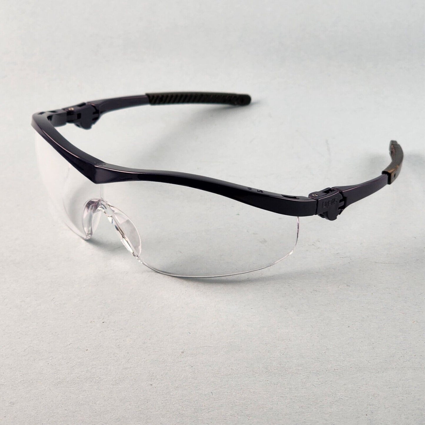 Crews Storm Safety Glasses Z87+ Wraparound Lens Ratchet Temples Eye Protection