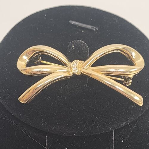 Gold Tone Bow Brooch with Clear Rhinestones 2" x 1.5"