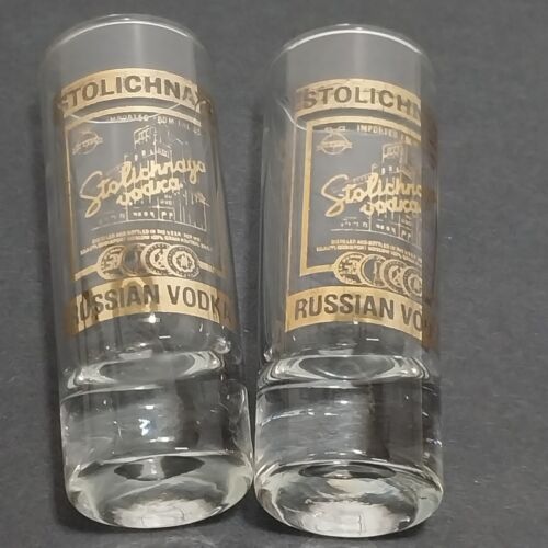 2 Stolichnaya Vodka Tall Double Shot Glasses Gold Leaf Logo
