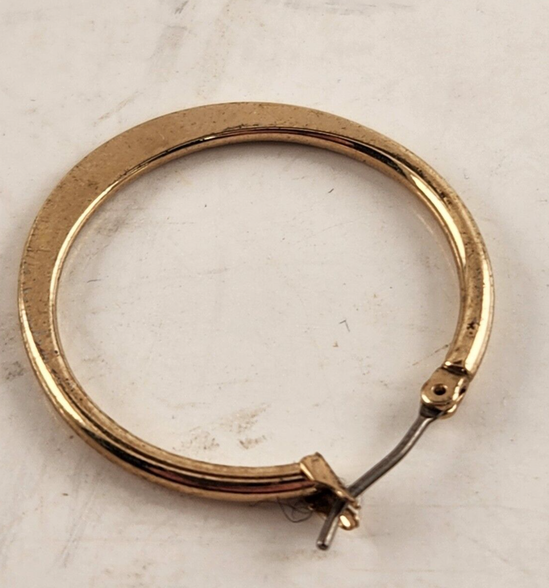 Single Set Of Golden Plated Hoop Earrings Round Shape With Clip