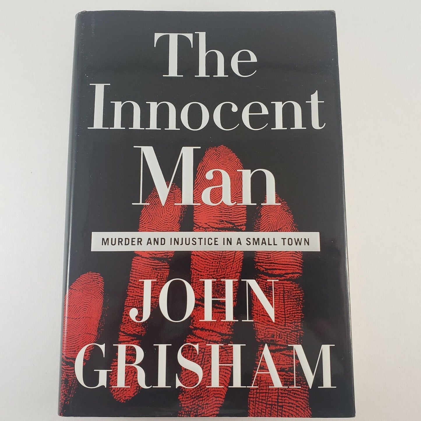 3 John Grisham Hardcover Novels with The Innocent Man ROGUE LAWYER Camino Island