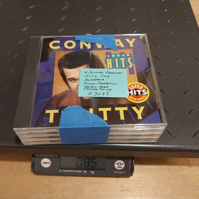 Set of 4 Country Hits CDs: Cash, Twitty, Alabama, Glen Campbell