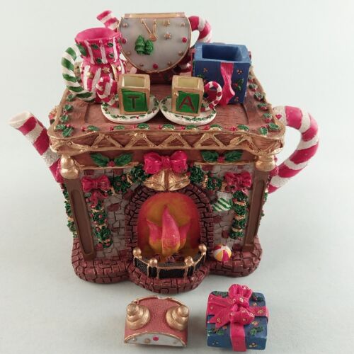 The Christmas Collectibles Fireplace Clock Wrapped Gifts Teapot By Seymour Mann