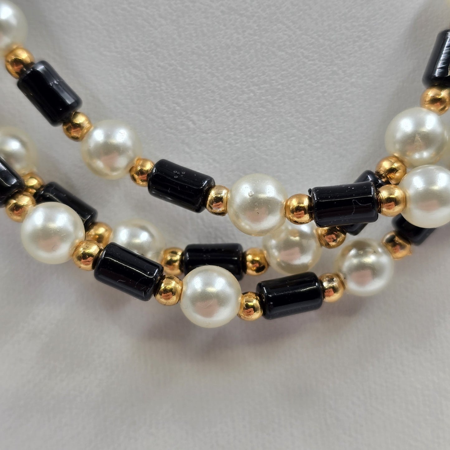 Multi Strand Necklace by Seta in Gold Tone Black Beads White Faux Pearl