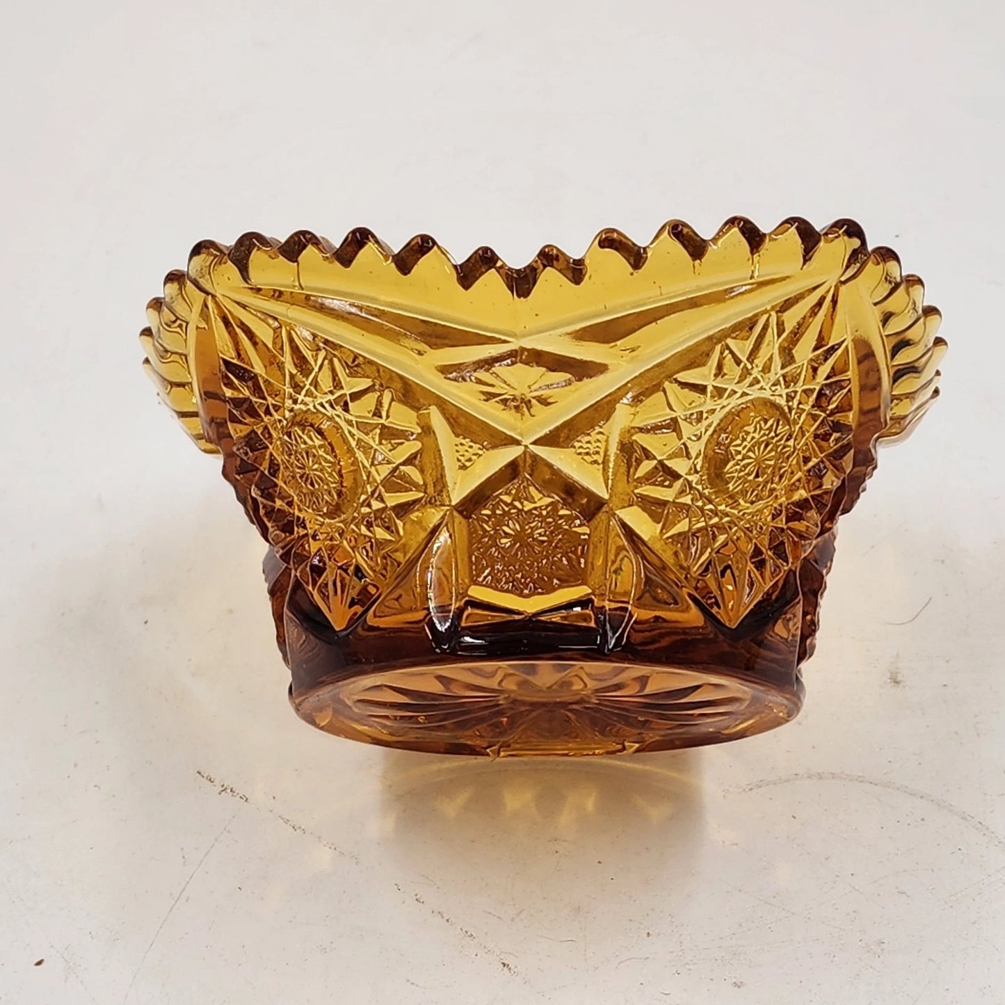 LE Smith Amber Glass Candy Nut Dish 6" Starburst Pattern Sawtooth Rim