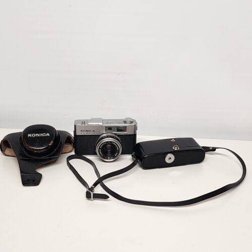 Konica EE-Matic Deluxe F 35mm Film Camera Hexanon 1:2.8 F=42mm AS IS Corrosion