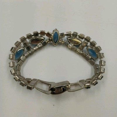 Vintage 1960s Blue Rhinestone Bracelet – Silver Tone Metal with Faceted Oval & Round Stones – Black Enamel & Leaf Detail – 7" Open Box Clasp