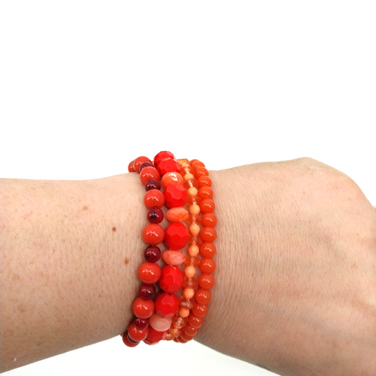 Set of 4 Bracelets in Faux Pearl Acrylic Beaded Orange and Red Tone Stretch 7"