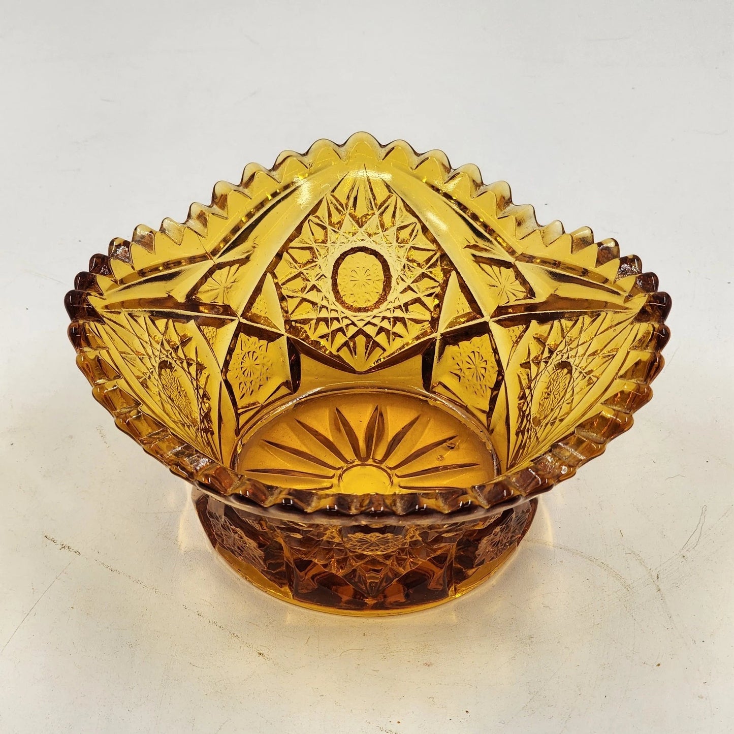LE Smith Amber Glass Candy Nut Dish 6" Starburst Pattern Sawtooth Rim