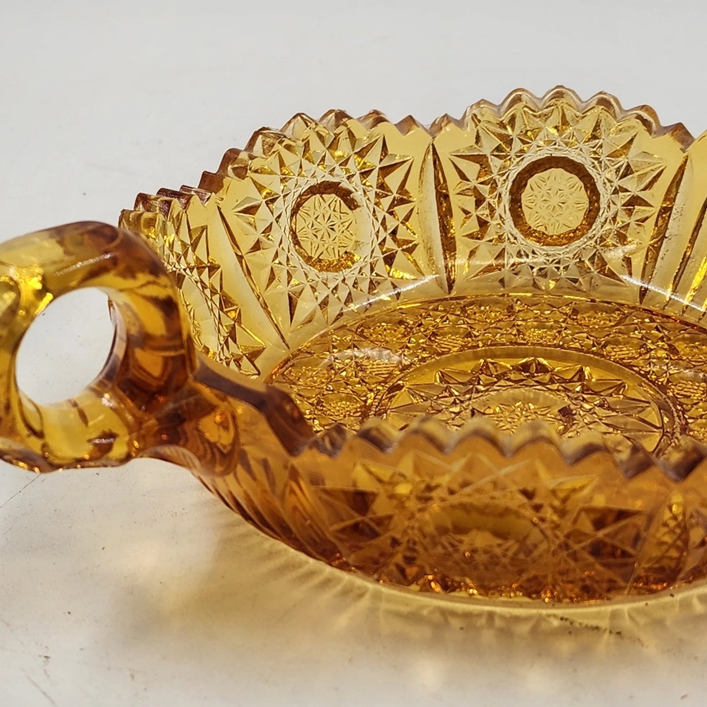 Amberina Cut Glass Nappy Bowl Hobstar Pattern 2 Handles Sawtooth Edge 8.75"