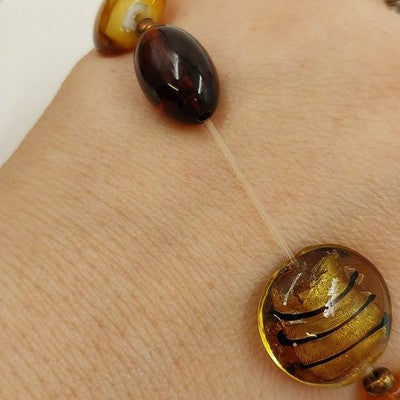 Avon Chic Multi Pattern Glass Beaded Leaf Elephant Charm Stretchable Bracelet