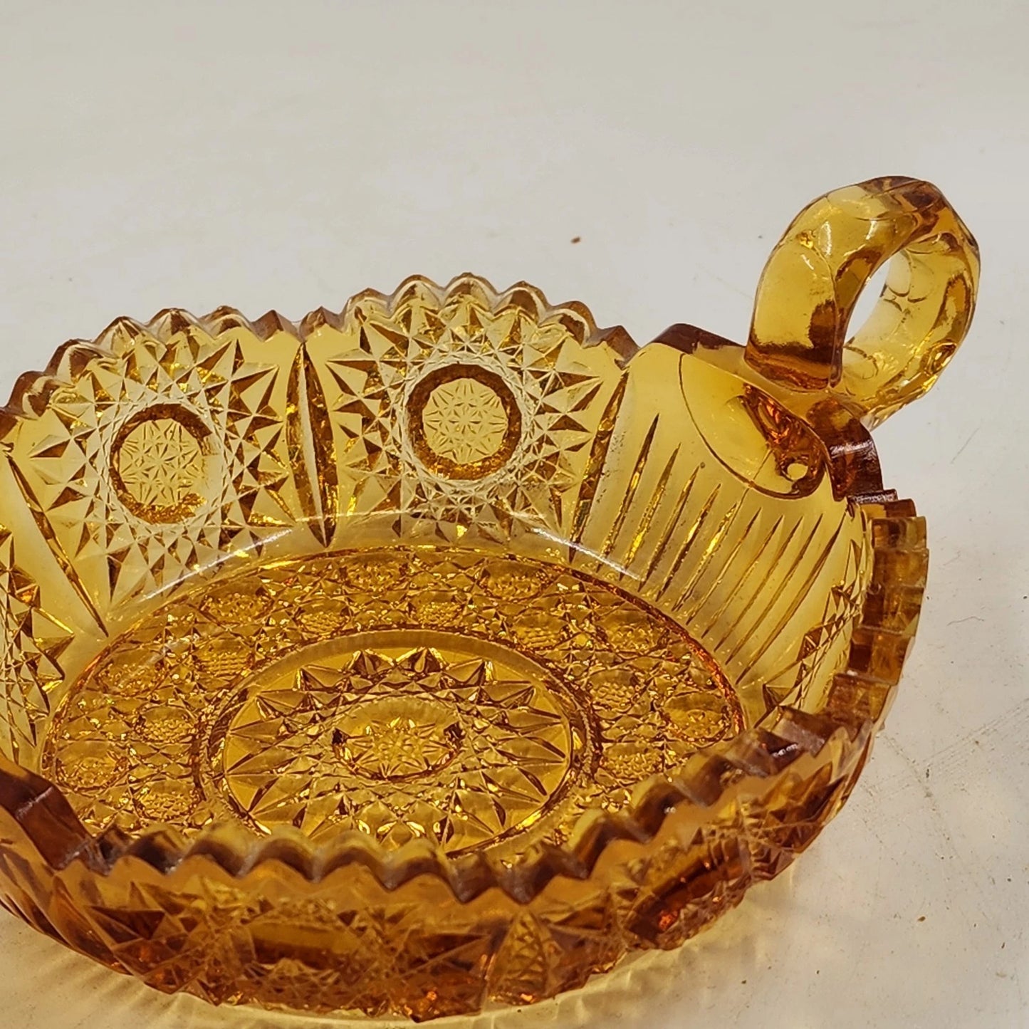 Amberina Cut Glass Nappy Bowl Hobstar Pattern 2 Handles Sawtooth Edge 8.75"