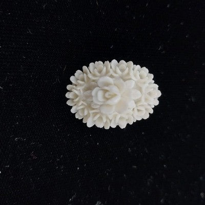 White Molded Celluloid Plastic Carved Style Brooch 1" Oval Flower Design