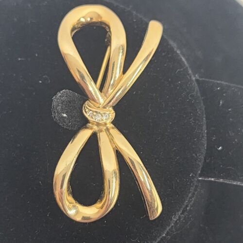 Gold Tone Bow Brooch with Clear Rhinestones 2" x 1.5"