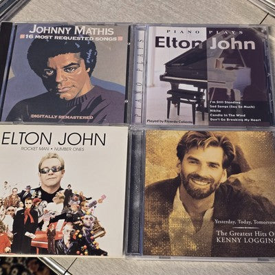 Set 4 Pop CDs with Kenny Loggins Johnny Mathis Elton John Caliente's Piano Play