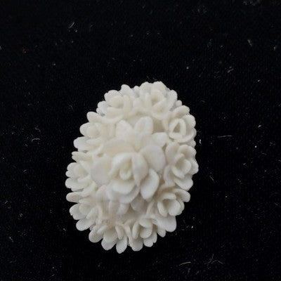 White Molded Celluloid Plastic Carved Style Brooch 1" Oval Flower Design