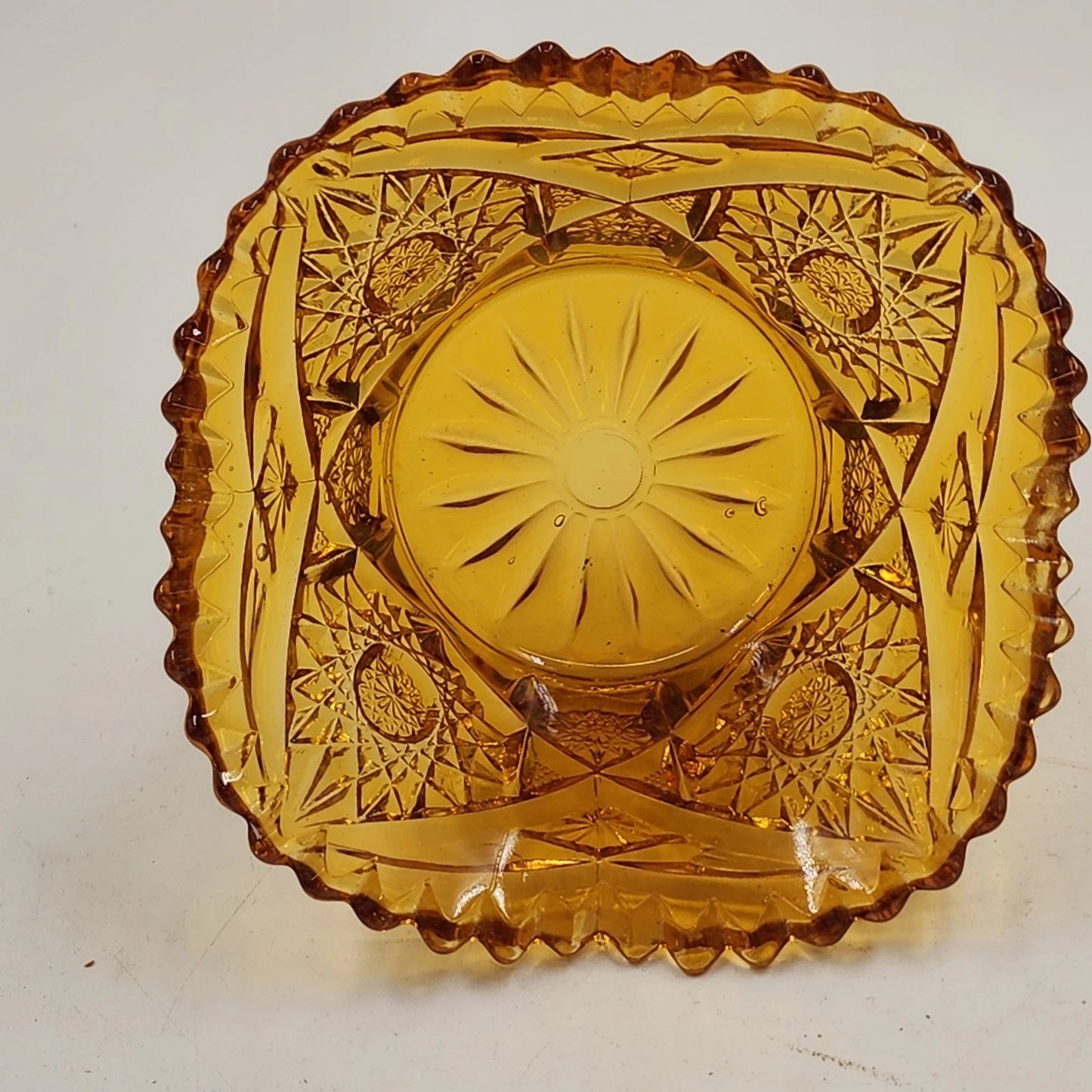 LE Smith Amber Glass Candy Nut Dish 6" Starburst Pattern Sawtooth Rim