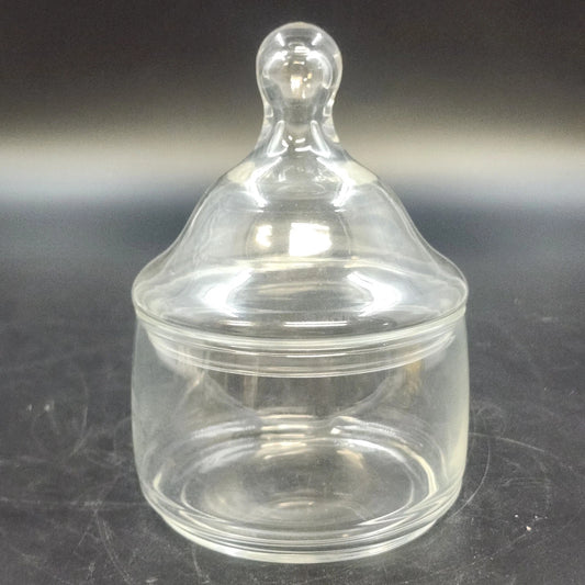 Vintage clear glass apothecary jar with domed lid and pointed finial