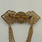 Gold Tone Filagree Metal Work & Cabochon Stone with Dangling Multi Chains Brooch