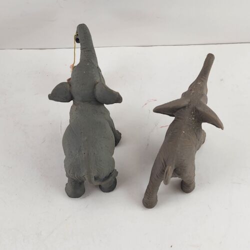 2 Miniature Gray Elephants One Swinging a White Bunny from it's Trunk 3.5" Long