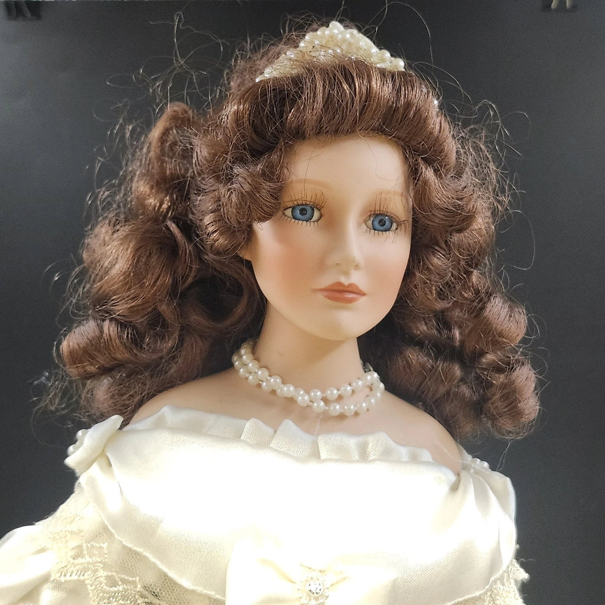 21 inch vintage porcelain bride doll with brunette hair, blue eyes and lace gown