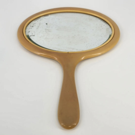 Large vintage beige hand mirror with beveled glass and celluloid frame