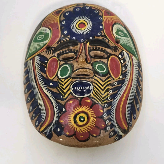 Hand-painted Mexican pottery wall mask with colorful folk art design