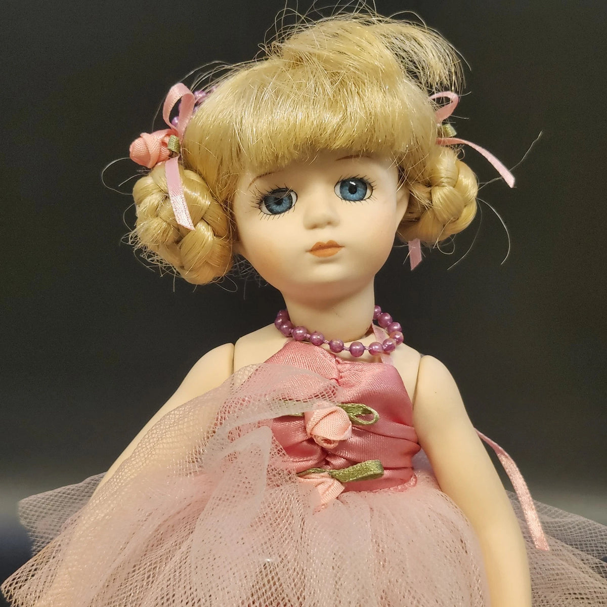 12 inch porcelain ballerina doll with blonde hair, blue eyes, pink tutu and stand