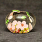 Clear Glass Apple Shaped Paperweight with Pink and Multicolor Flowers 3" Across