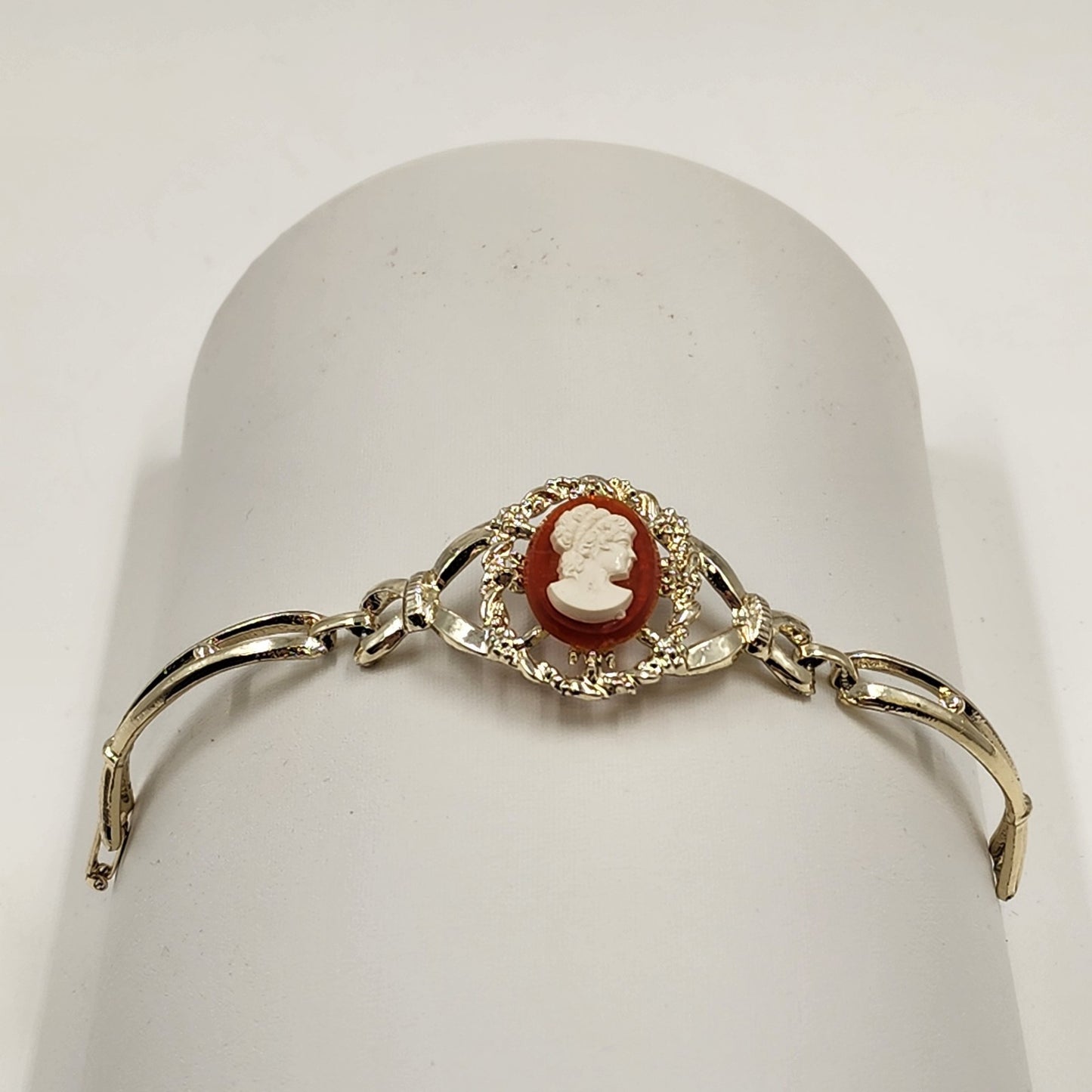 Gold Tone Hinged Bangle Bracelet with Red and White Lady Shell Cameo Charm 7"