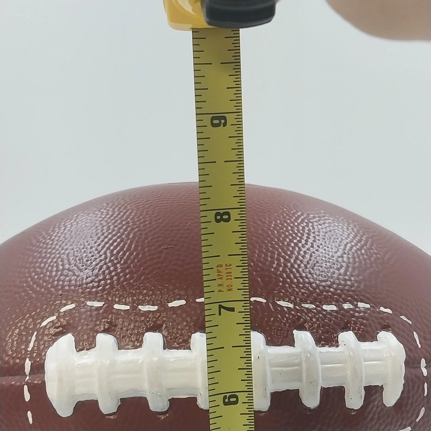 Ceramic Football Coin Bank Textured Sport Piggy Bank Brown on Pedestal Base 9.5"