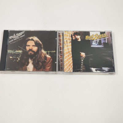 Two Bob Seger CDs featuring Stranger in Town and Greatest Hits Vol. II