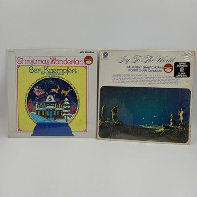 Two vintage Christmas vinyl LPs featuring R Shaw Chorale and Bert Kaempfert