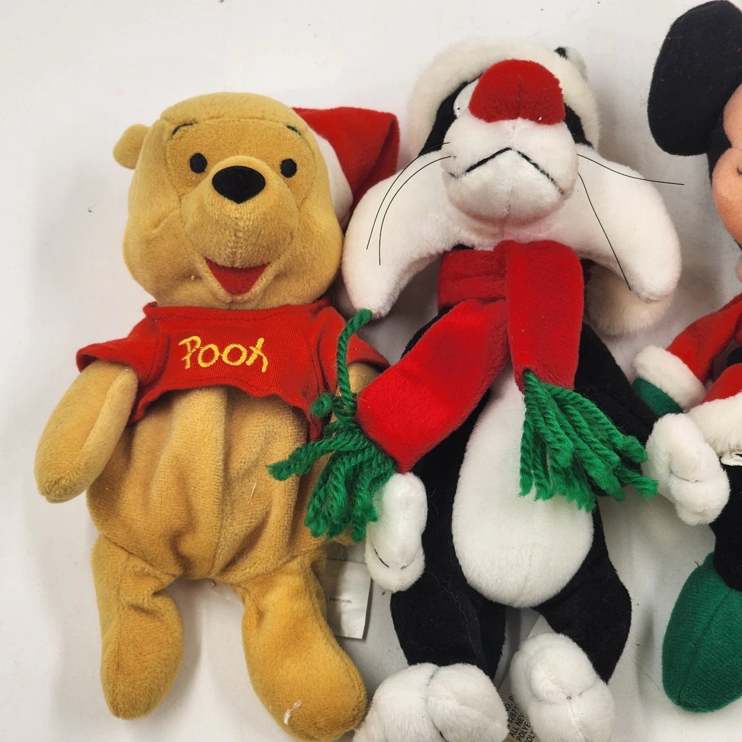 4 Beanie Babies Plush 3 Disney Pooh Mickey & Minnie and 1 Warner Bros Sylvester