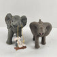 2 Miniature Gray Elephants One Swinging a White Bunny from it's Trunk 3.5" Long