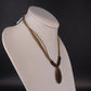 Linea Pele Brushed Gold Teardrop Pendant Necklace With Multi Strand Brown Cord