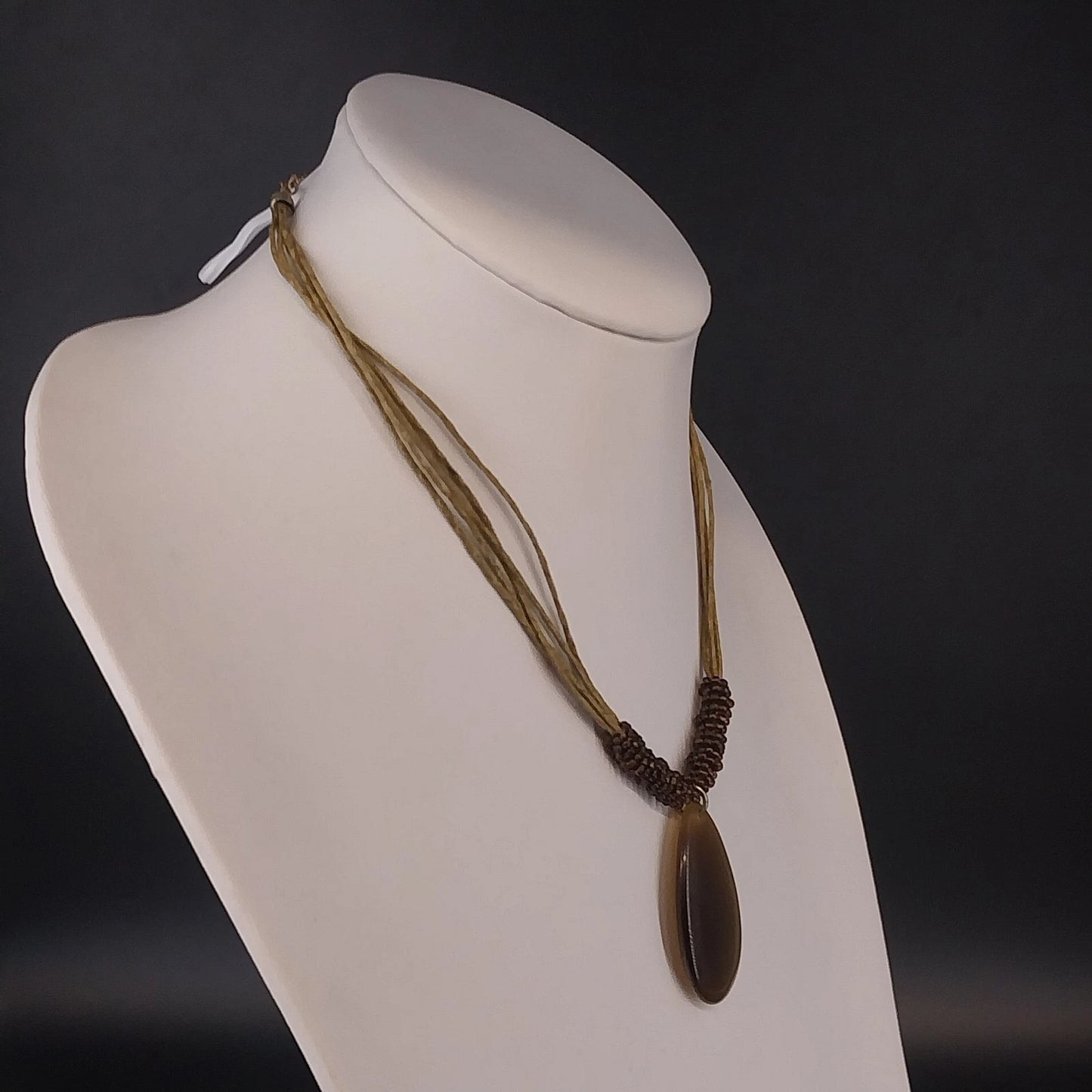 Linea Pele Brushed Gold Teardrop Pendant Necklace With Multi Strand Brown Cord