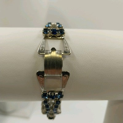 Vintage 1960s Blue Rhinestone Bracelet – Silver Tone Metal with Faceted Oval & Round Stones – Black Enamel & Leaf Detail – 7" Open Box Clasp