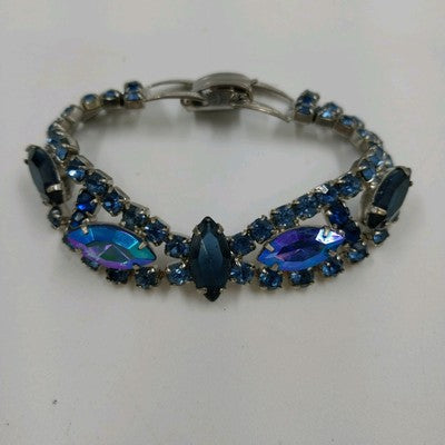 Vintage 1960s Blue Rhinestone Bracelet – Silver Tone Metal with Faceted Oval & Round Stones – Black Enamel & Leaf Detail – 7" Open Box Clasp