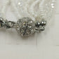 Nine Strand Clear White Small Beaded Magnetic Bracelet w Silver Tone Rhinestone