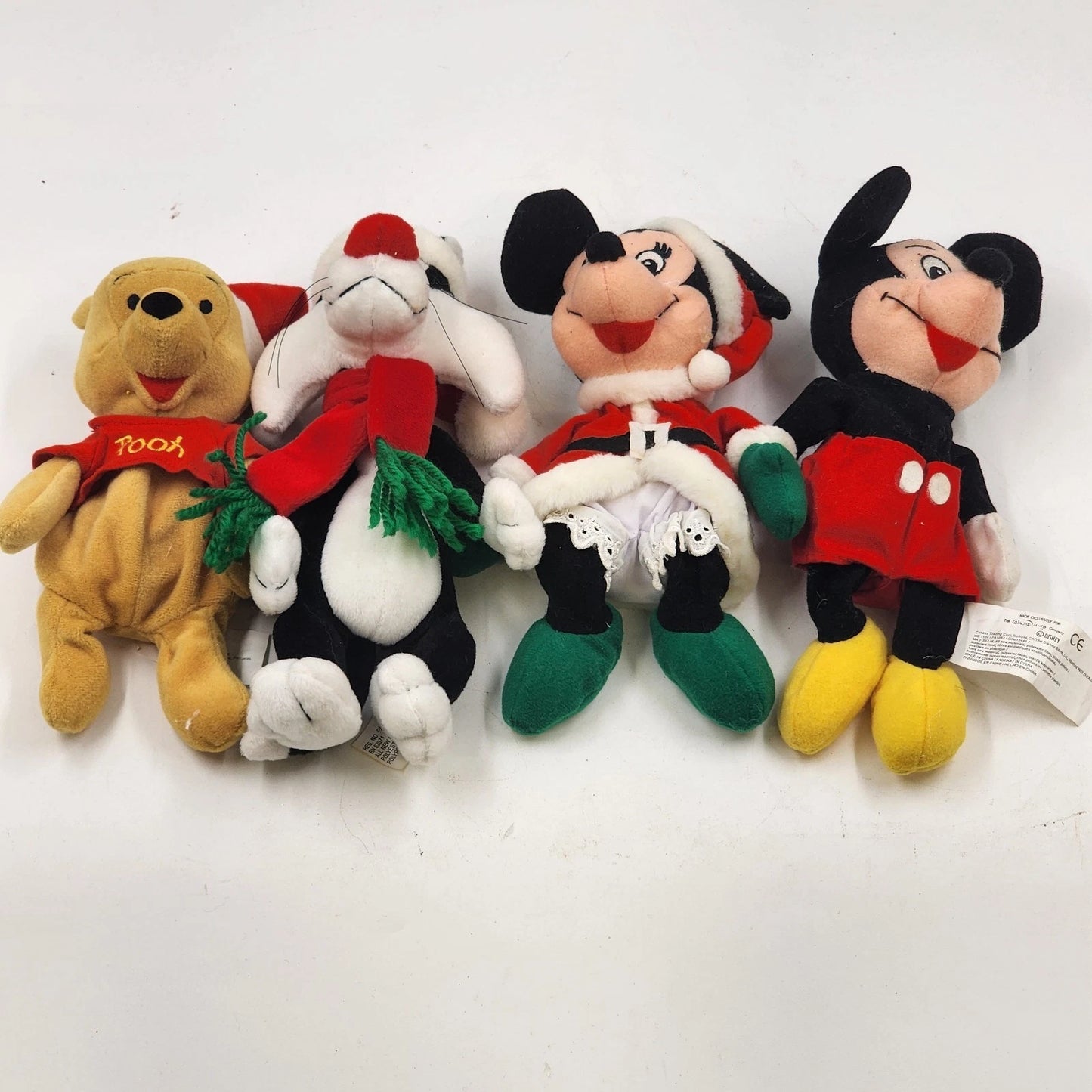 4 Beanie Babies Plush 3 Disney Pooh Mickey & Minnie and 1 Warner Bros Sylvester