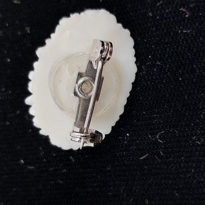 White Molded Celluloid Plastic Carved Style Brooch 1" Oval Flower Design