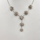 Silver Tone Chain Rhinestone Starburst Flower Pendant 10" Long Necklace Lobster