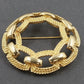 Monet Gold Tone Circle Brooch Interwoven Rope Chain Openwork Vintage