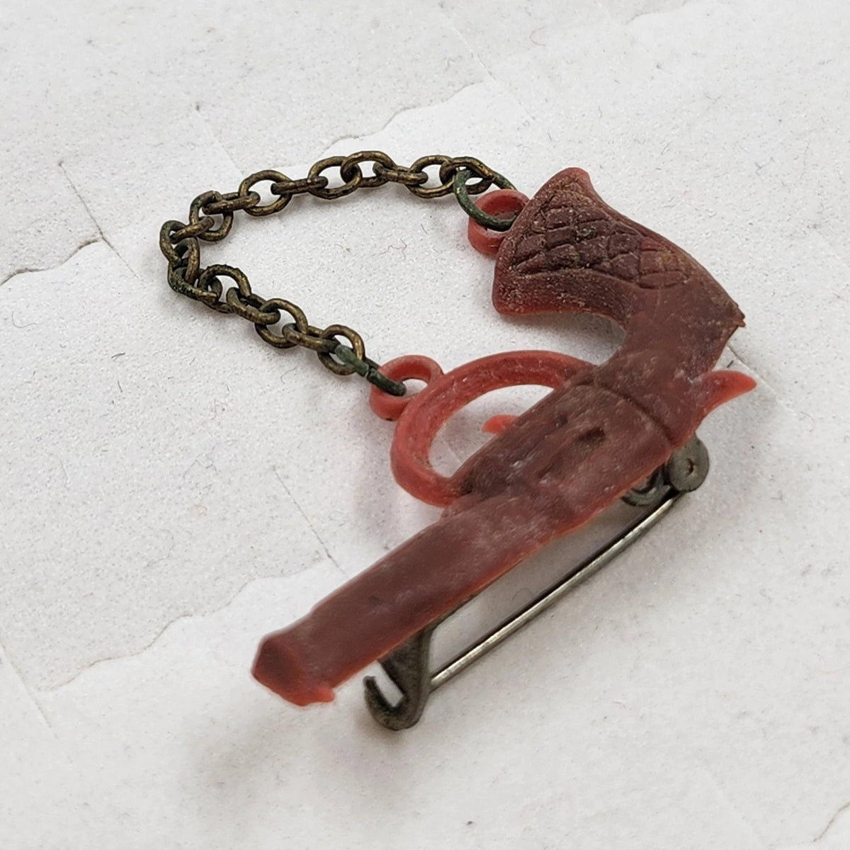 Title: Western Revolver Pistol Brooch Pin Red Miniature Gun Chain Novelty Vtg