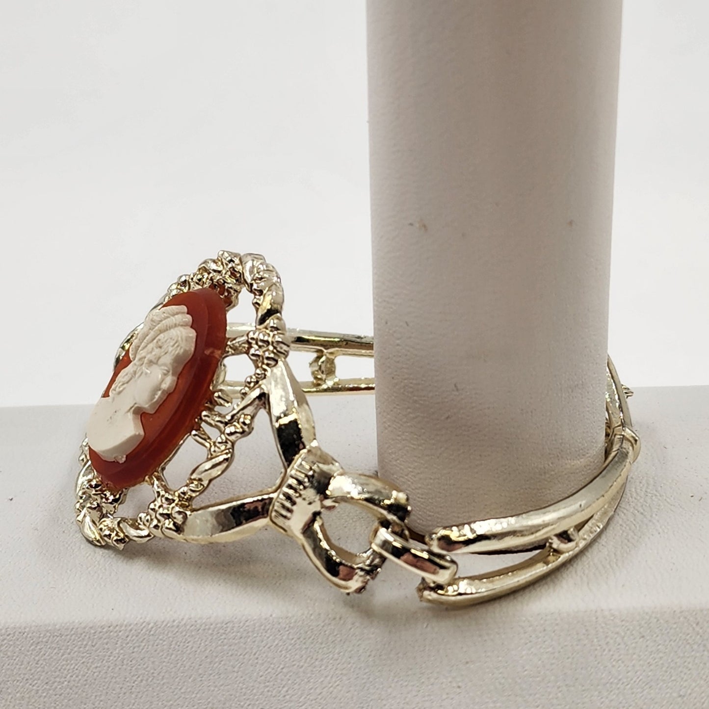 Gold Tone Hinged Bangle Bracelet with Red and White Lady Shell Cameo Charm 7"