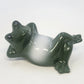 4-inch glossy ceramic frog figurine in a reclining lounging pose
