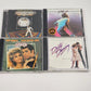 Four classic movie soundtrack CDs including Dirty Dancing and Grease
