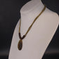 Linea Pele Brushed Gold Teardrop Pendant Necklace With Multi Strand Brown Cord